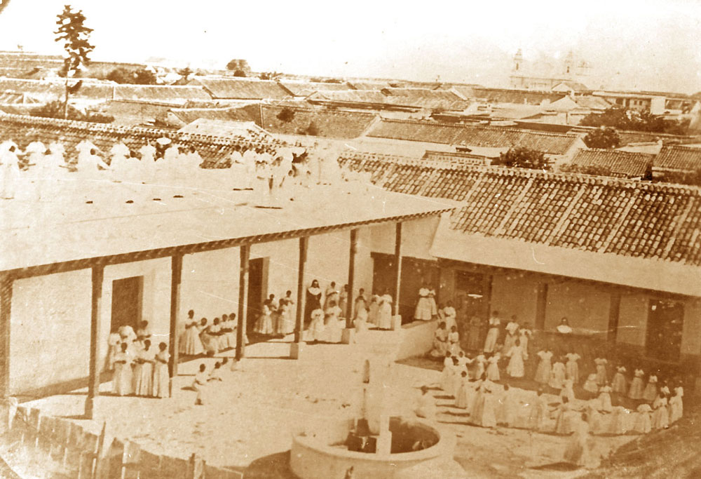 1875 Guatemala students in belen patio water fountain edit improved