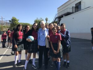 Judith Flahavan with middle school students at Notre Dame Santa Barbara