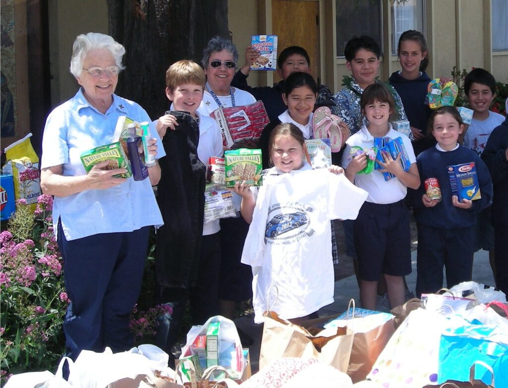 Sister Teresa Ann Leahy, teachers, and students gathered donations for the Notre Dame orphanage in Zimbabwe.