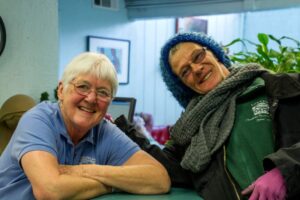 Sister Anne Locke with client Donna at Maryhouse in Sacramento, CA.