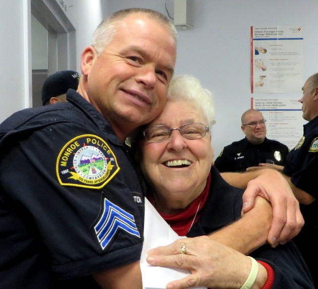 Sr. Barbara with Sgt. Johnston of the Monroe Police Department. (Photo Credit: Chris Hendrickson/Monroe Monitor)