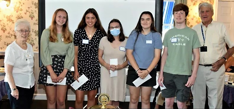 Sister Leonore Coan (left) with recipients of Rotary Club scholarships in April 2022. (Photo credit: Bob Snow)