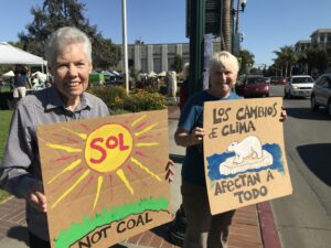 Sisters Judy Flahavan and Susan Olson advocate for climate responsibility.
