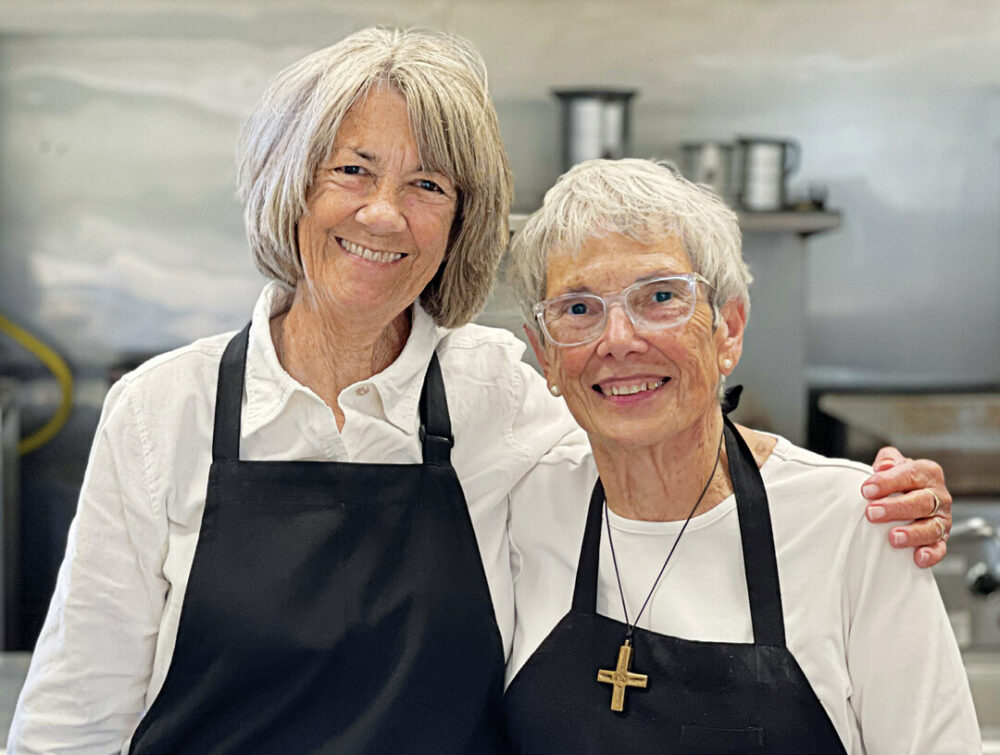 Ellen Chiri, new TOP director with Sister Jeanette Braun in the TOP kitchen.
