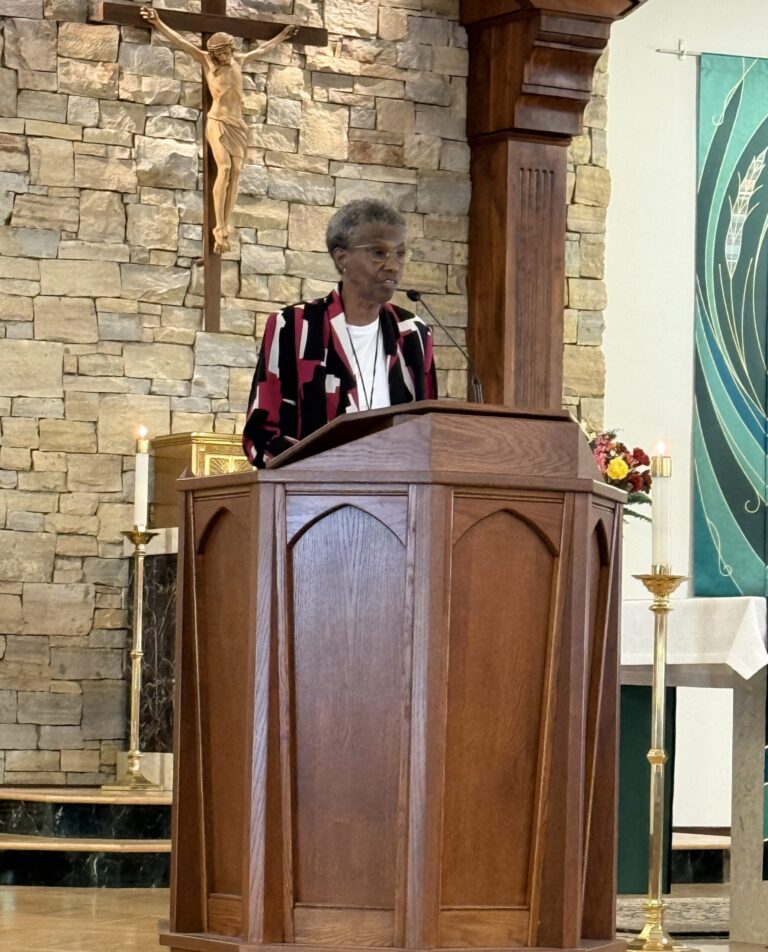 Sr Patricia Chappell at a podium