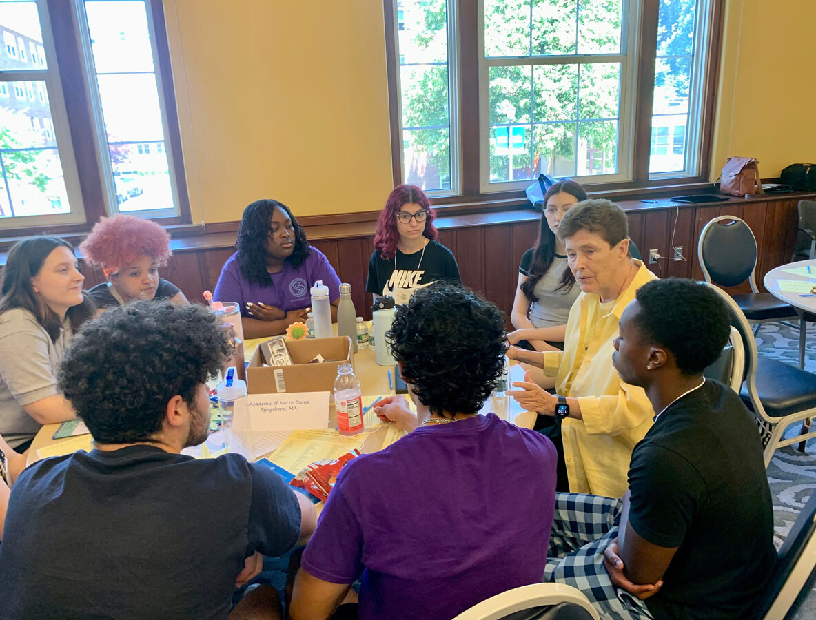 Sr. Kristin Hokanson, SNDdeN with HS Students