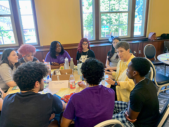 Sr. Kristin Hokanson, SNDdeN with HS Students