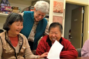 Sr. Mary Pat McCarron with students at the Catholic Worker English Language School in Redwood City, CA.