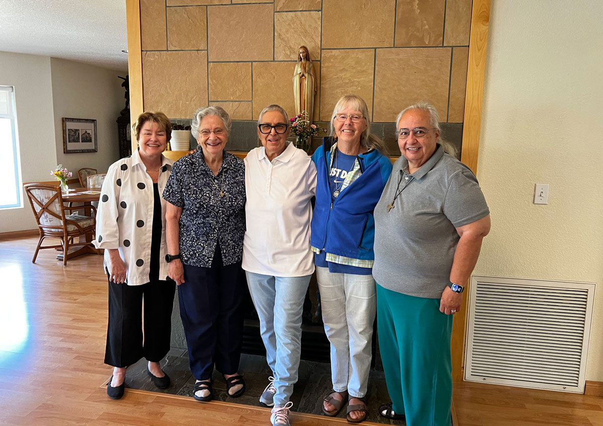 become an associate hero2 Associates and Sisters Anne Hannigan, AND, Sister Yvonne Bondi, SNDdeN, Lydia Wahab, Lynne Clarkin, AND, and Sister Carmen Silva, SNDdeN