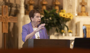 Sister Pat O'Brien at podium Emmanuel Jubilee 2026