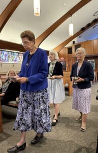 Sister Pat Obrien leads procession with Maria Delaney and Ginny Scally Windsor Jubilee 2026